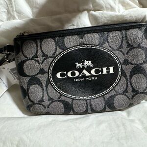 Brand new Coach wristlet